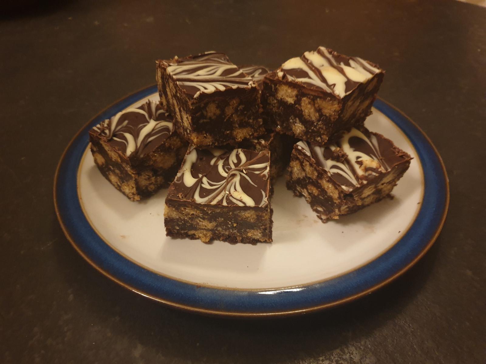 Chocolate tiffin squares finished with a feathered white chocolate top