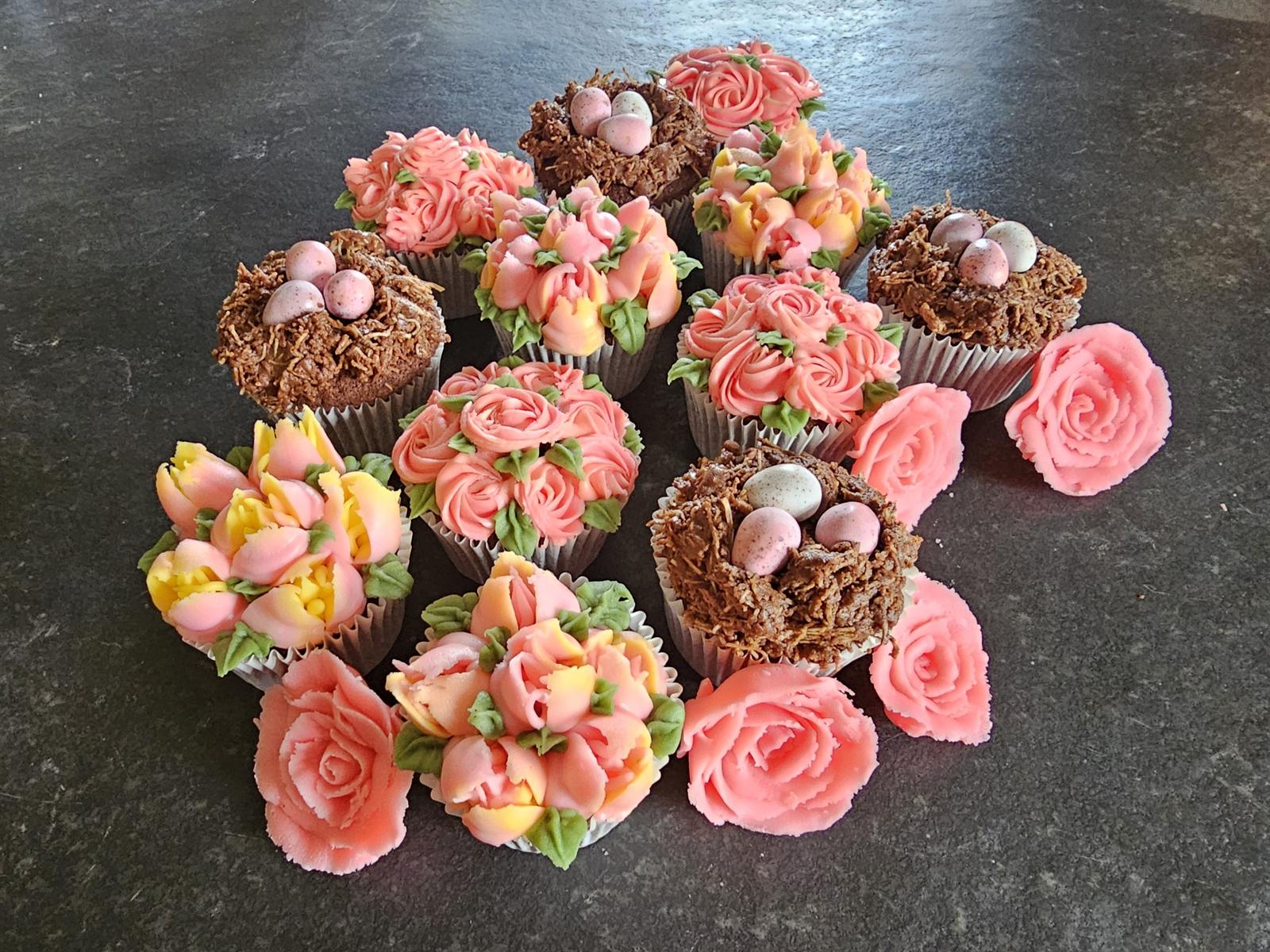 Cup cakes piped with buttercream roses and tulips