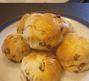 Glazed fruit scones on a plate